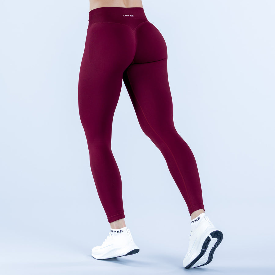 Burgundy impact leggings with high waist and fitted ankle length