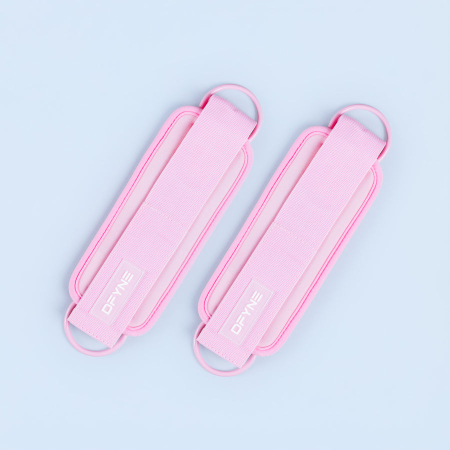 Pink fabric ankle straps with padded webbing and loop handles