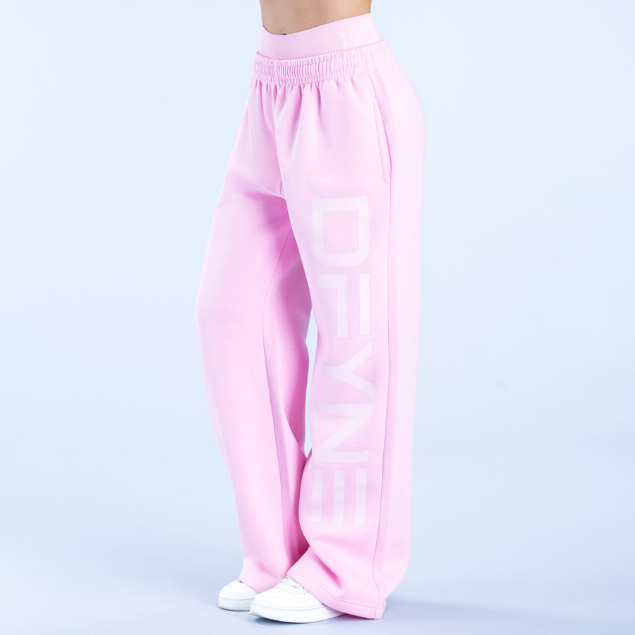 Pink wide-leg jogger pants with elastic waistband and large back logo print