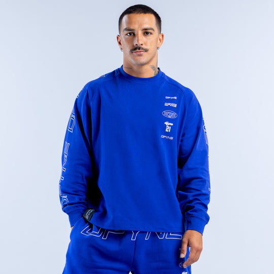 Blue long sleeve top with white graphic prints on chest and sleeves