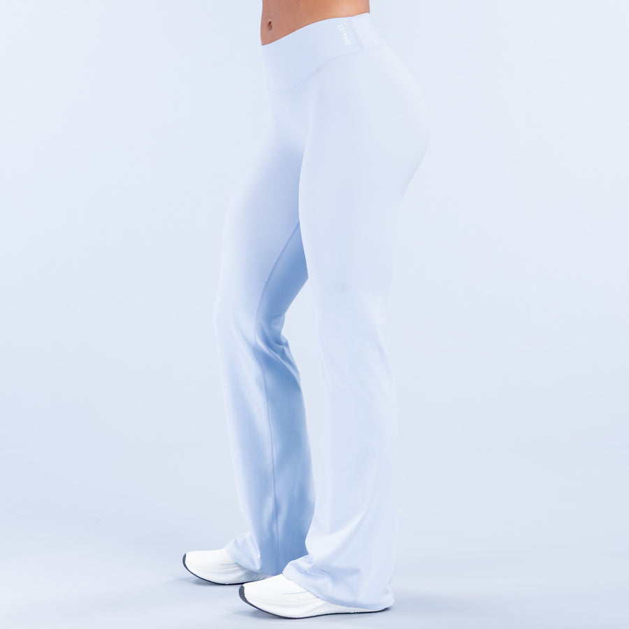 Light blue flared pants, back three-quarter view, full length