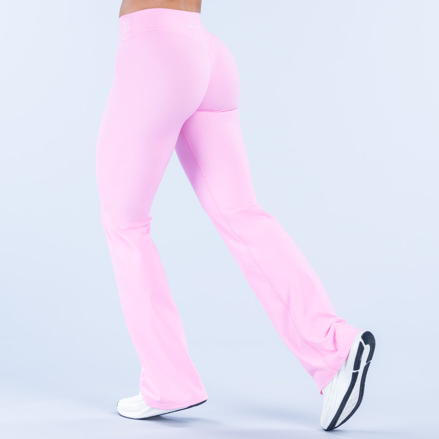 Pink flared pants, contoured back with wide leg opening