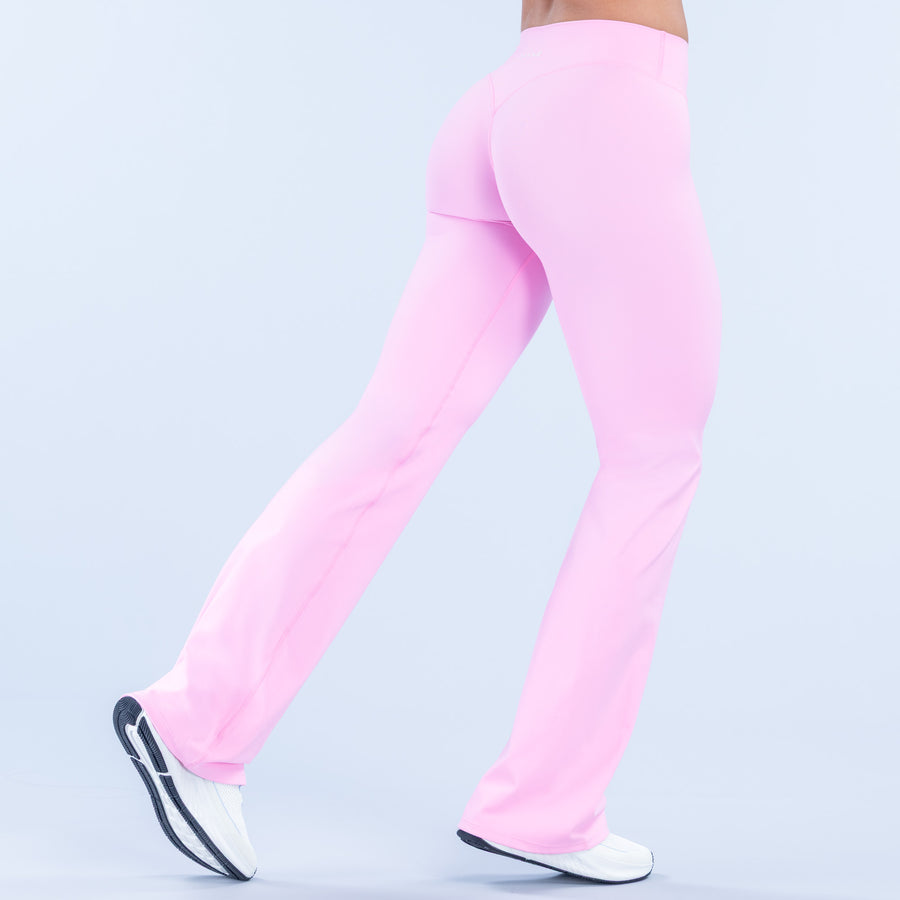Pink flared pants, back view with wide bell bottom