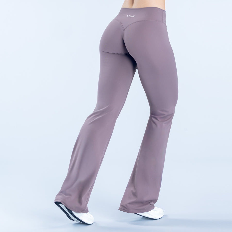 High-waist mauve flared leggings, back view with wide leg opening at ankles.