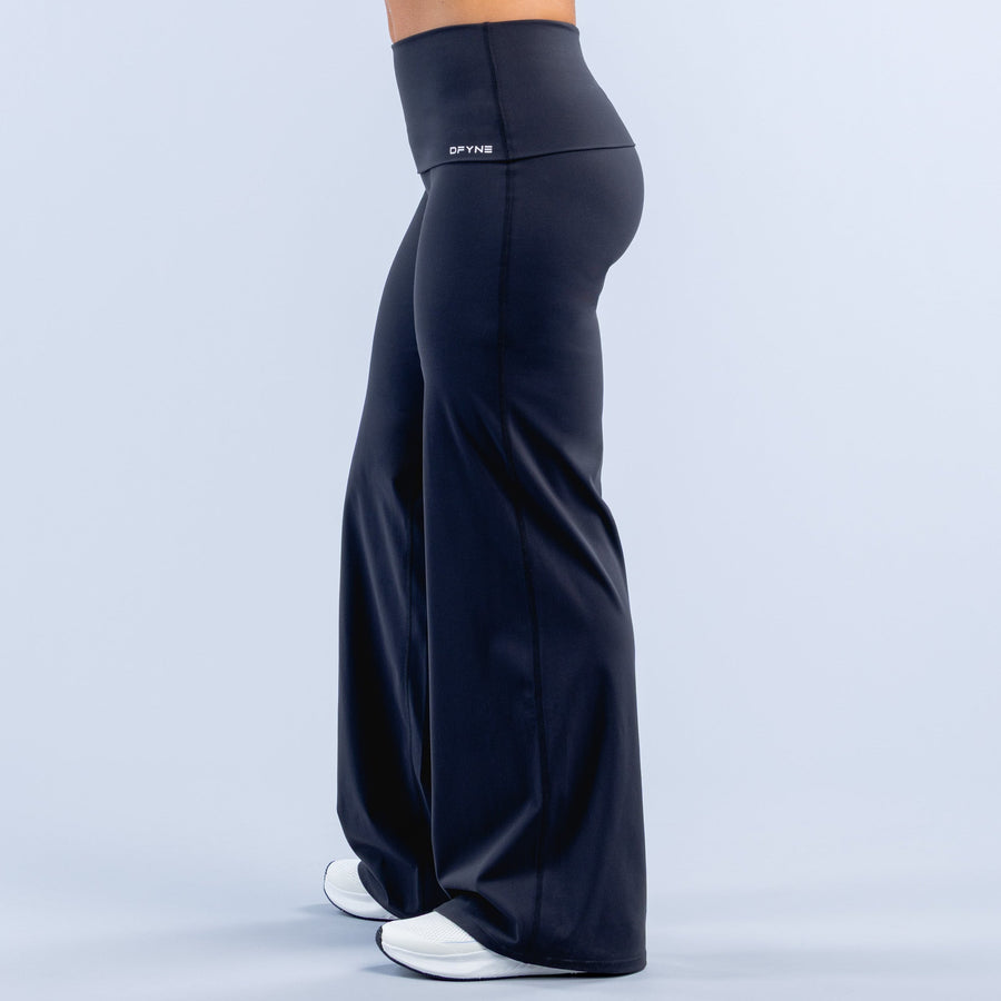 Dark navy wide-leg pants with fold-over waistband, back view, long flowing legs