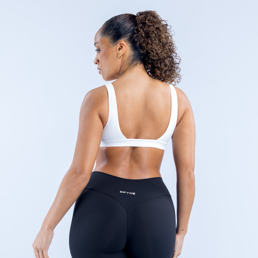 White racerback sports bra from back, smooth stretch fabric