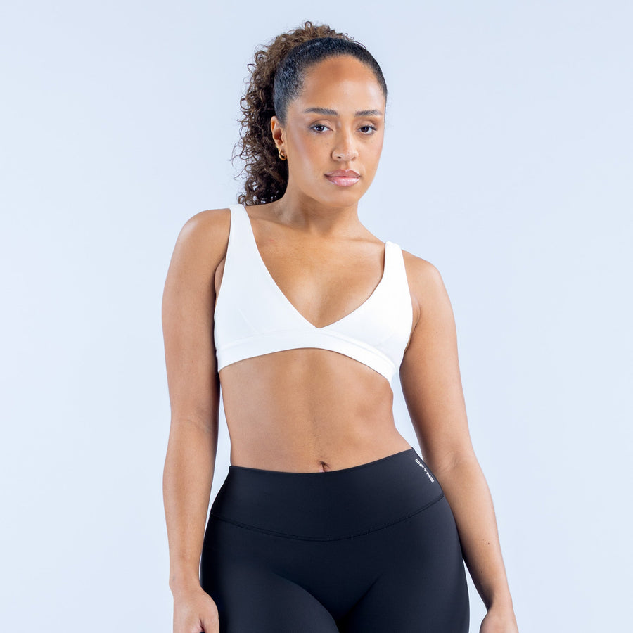 White minimal V-neck sports bra with racerback straps