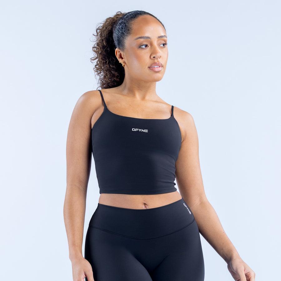Strappy cropped top with thin straps and scoop neckline, dark fitted front