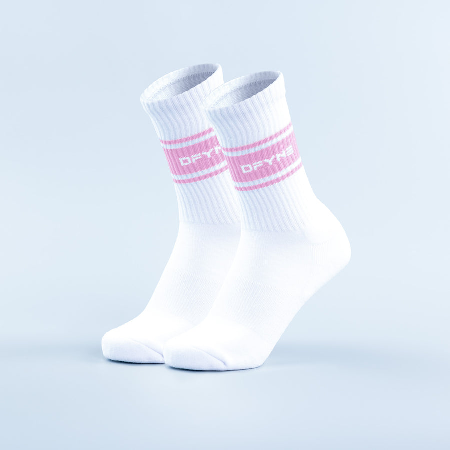 Pair of white crew socks with pink stripe and logo across the cuff, ribbed knit