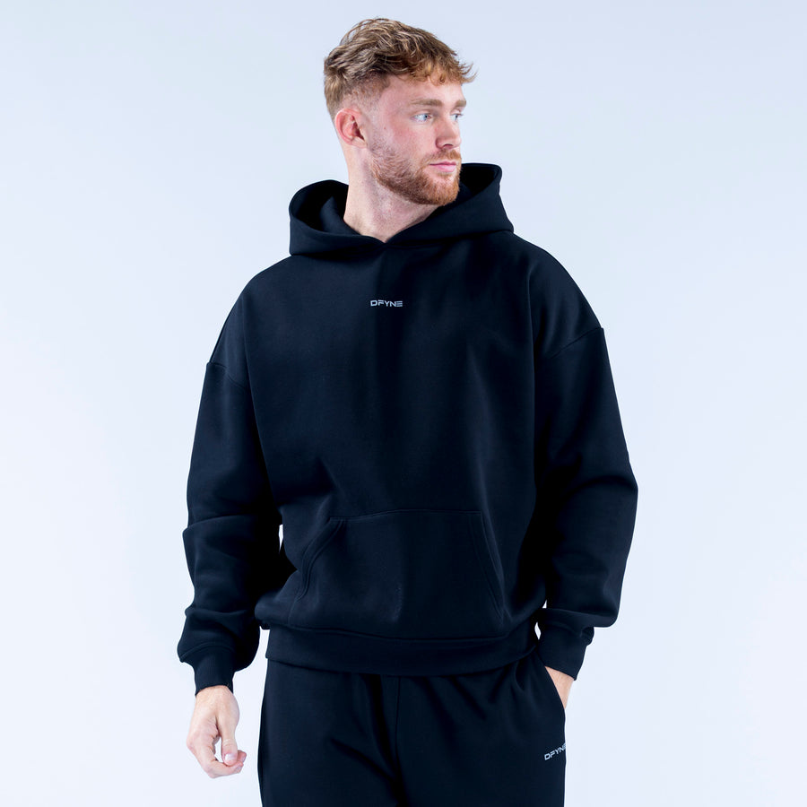 Dark pullover graphic hoodie with hood and kangaroo pocket, small chest logo