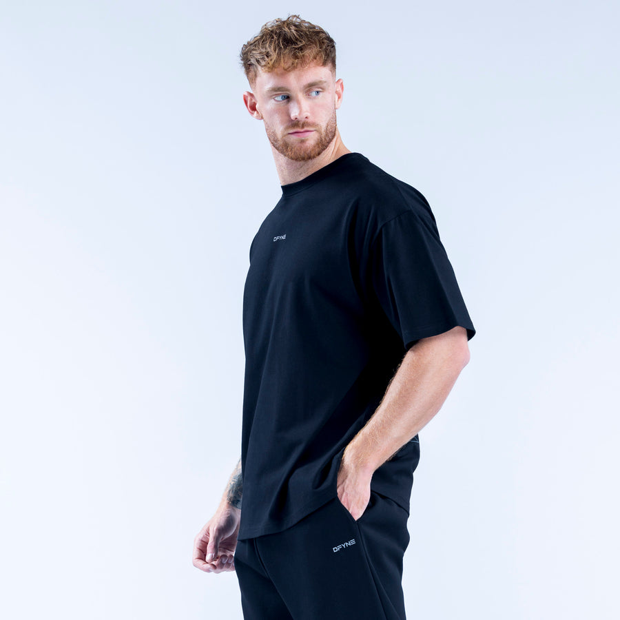 Recharge graphic t-shirt, dark short-sleeve with small chest print.