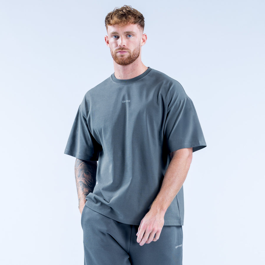 Men's graphic T-shirt in dark gray with small chest logo, crew neck, short sleeves