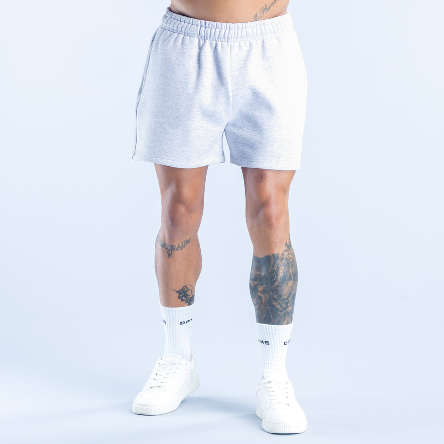 Light blue sweat shorts with elastic waistband and straight hem, front view