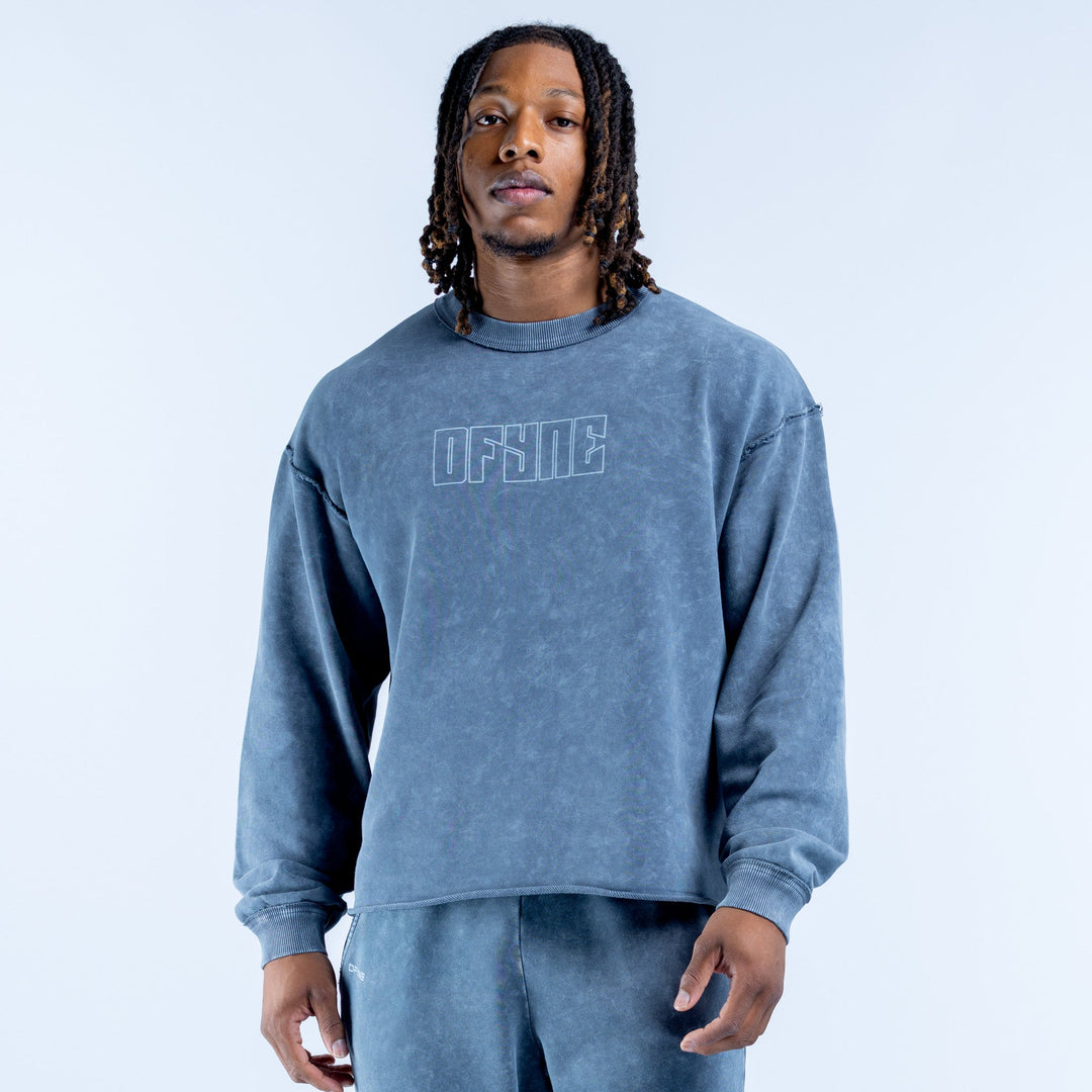 Washed blue crewneck sweatshirt with front OFFSITE graphic and long sleeves