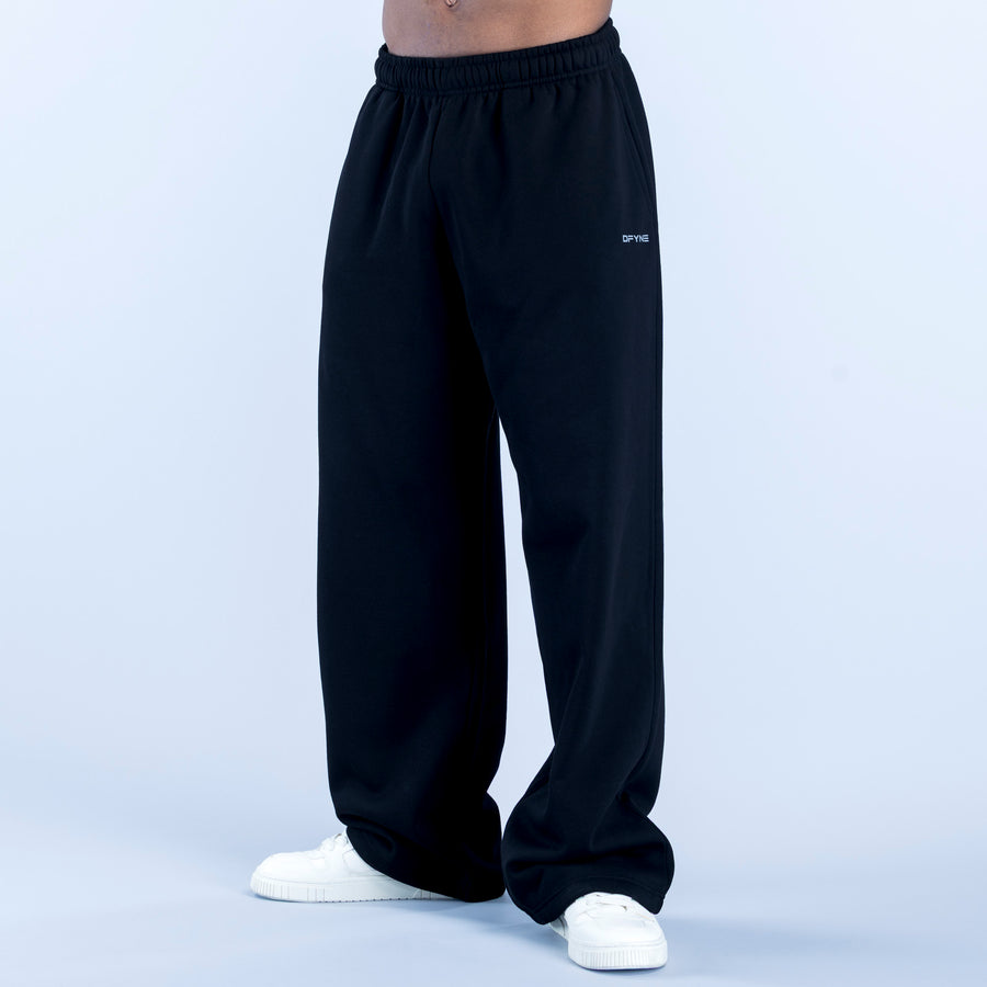 Dark straight-leg joggers with elastic waistband and draped fabric