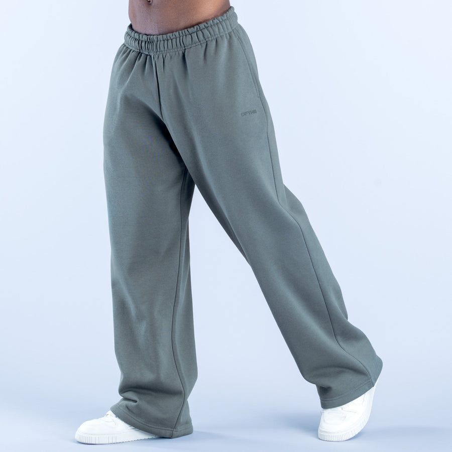 Sage green straight-leg joggers with elastic waistband and side pockets