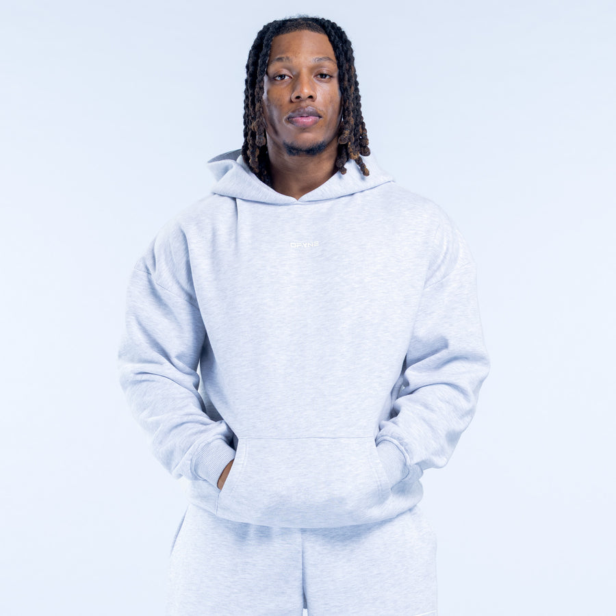 Light gray pullover hoodie with hood and kangaroo pocket, long sleeves, drawstring.