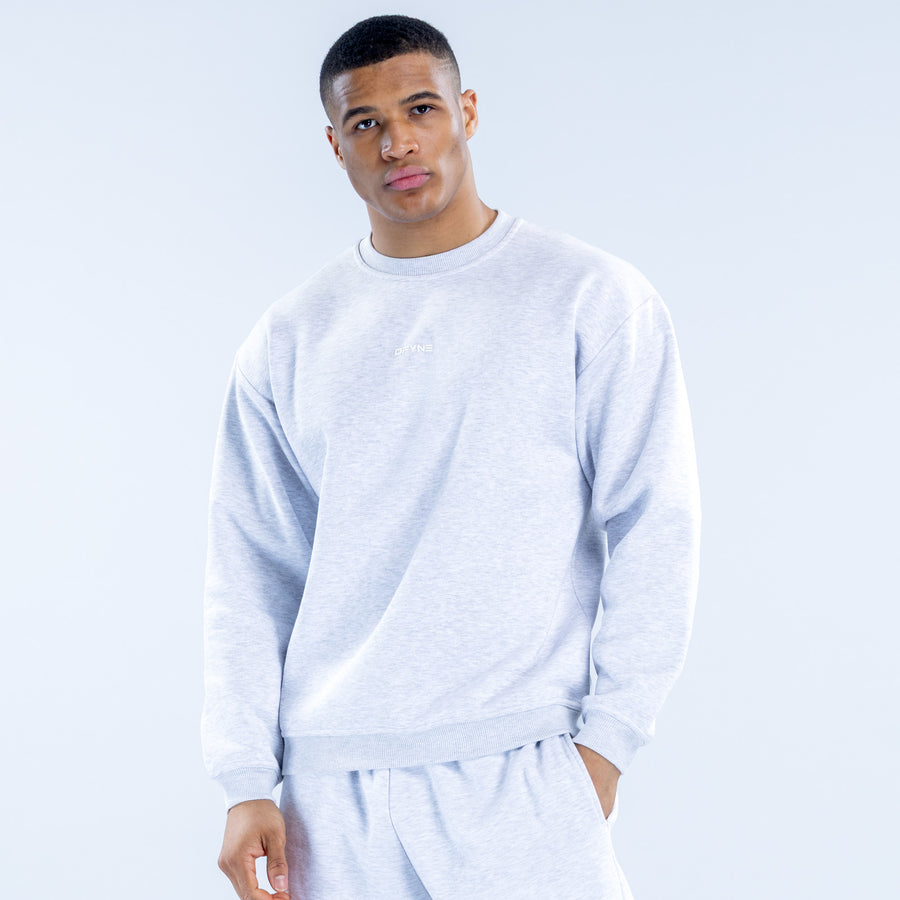 Light gray crewneck sweatshirt with long sleeves and ribbed cuffs