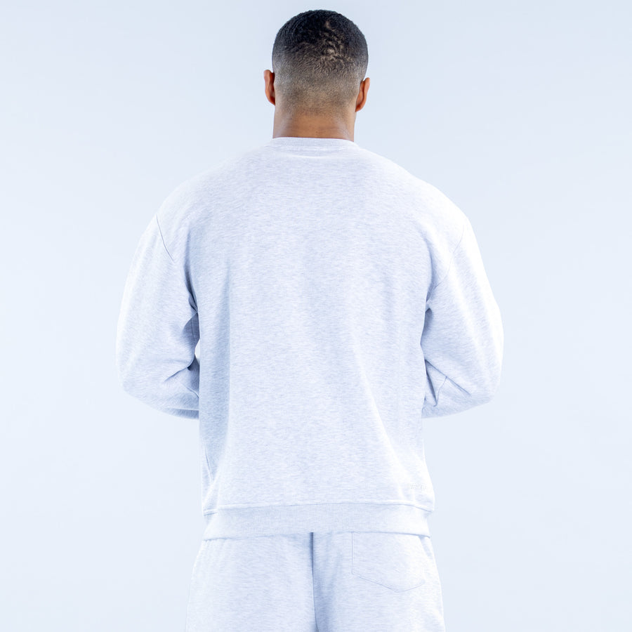 Light gray crewneck sweatshirt, back view, ribbed cuffs and hem