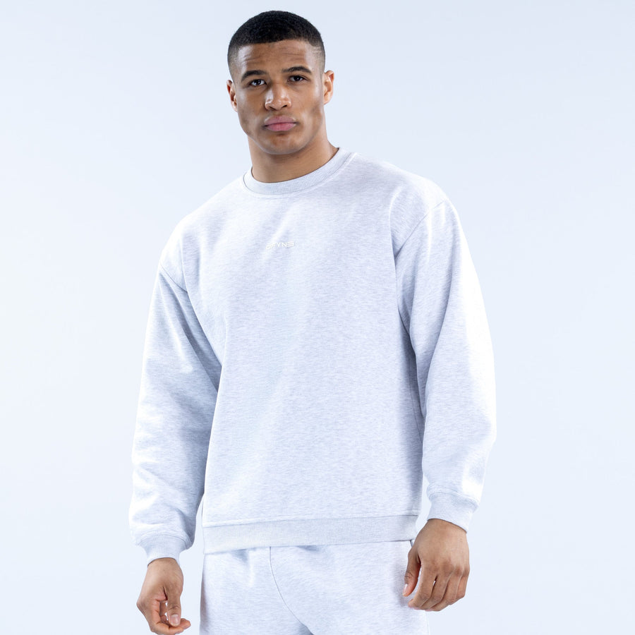 Light heather gray crewneck sweatshirt with long sleeves and ribbed cuffs