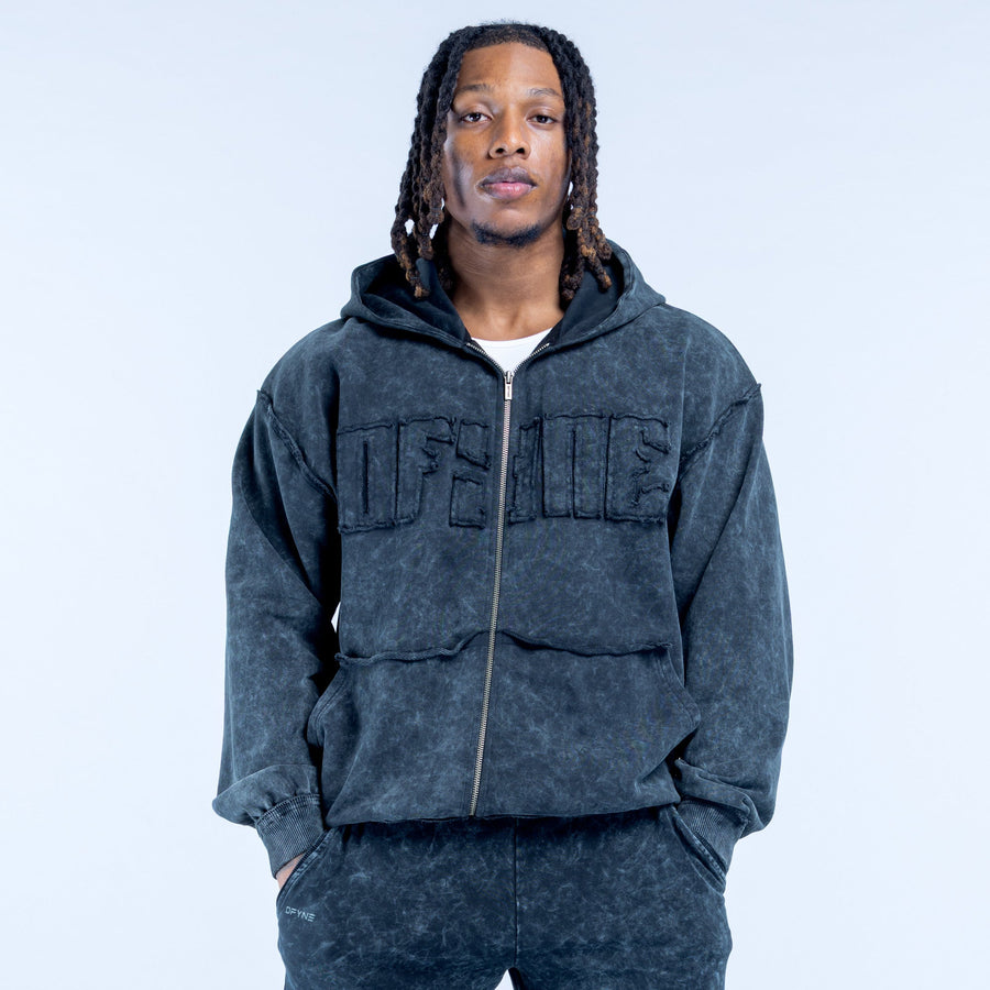 Dark gray washed zip hoodie with hood, front zip, and bold chest lettering