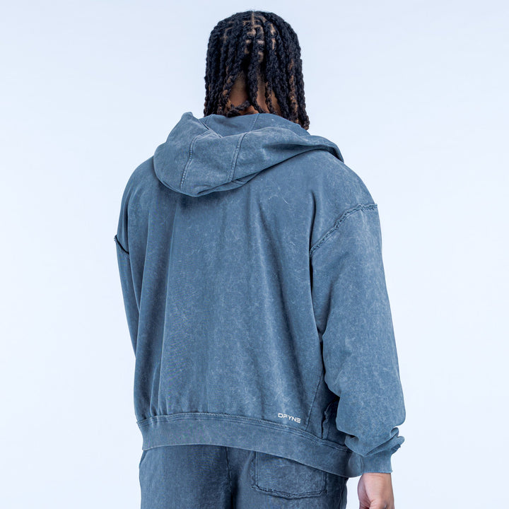 Washed blue zip hoodie, hooded back view with ribbed cuffs and hem