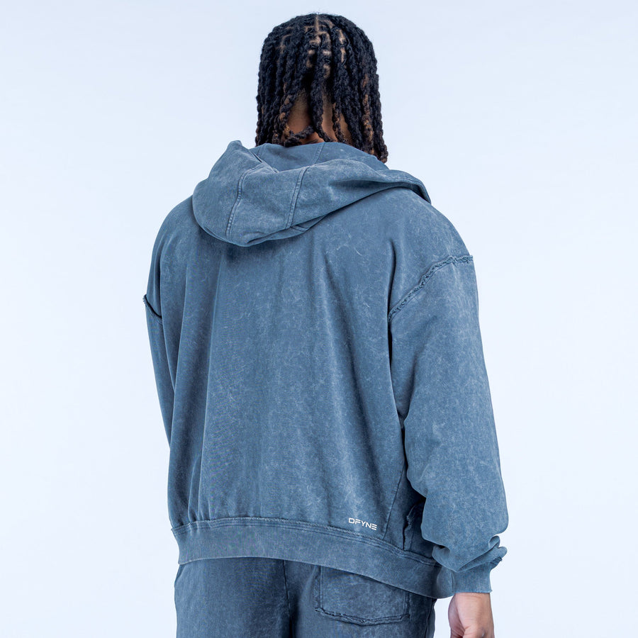 Washed blue zip hoodie, hooded back view with ribbed cuffs and hem
