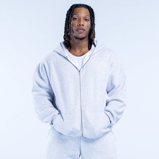 Light blue zip-up hoodie with hood, full front zipper, and kangaroo pocket