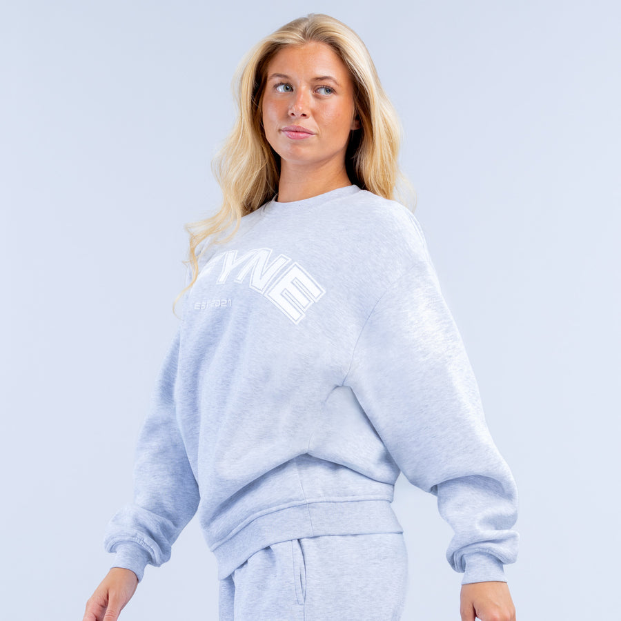 Light blue graphic crewneck sweatshirt with large chest logo