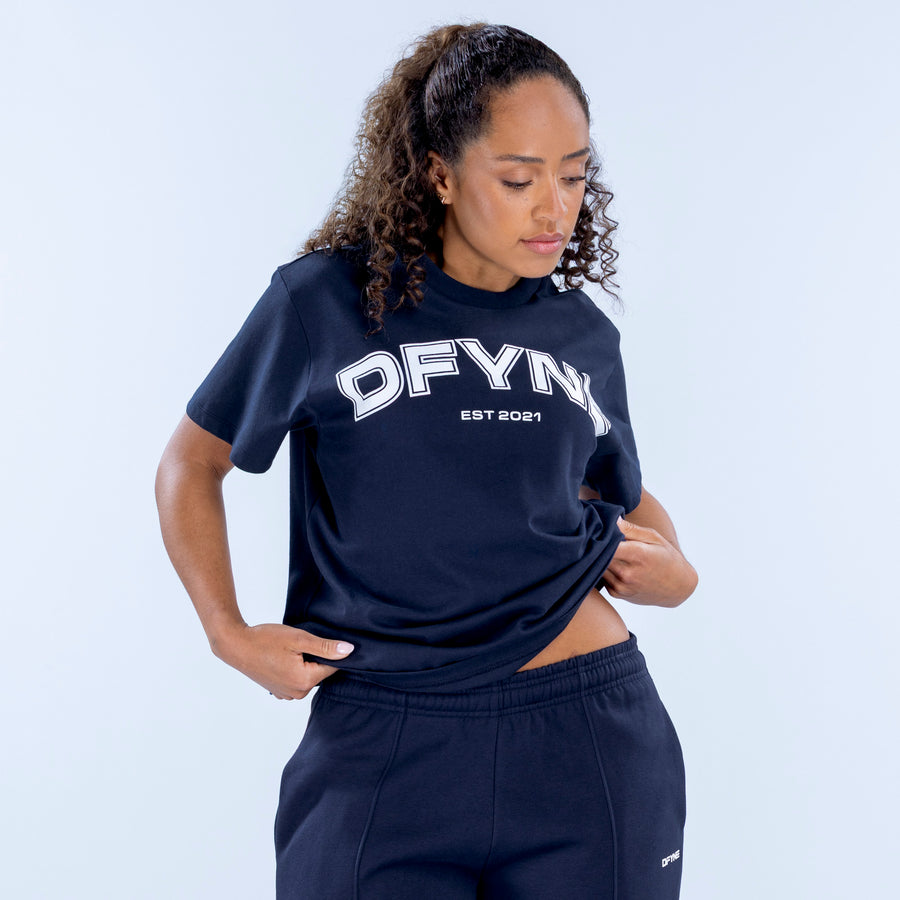 Navy oversized graphic tee with chest OFYN logo, relaxed cropped front view