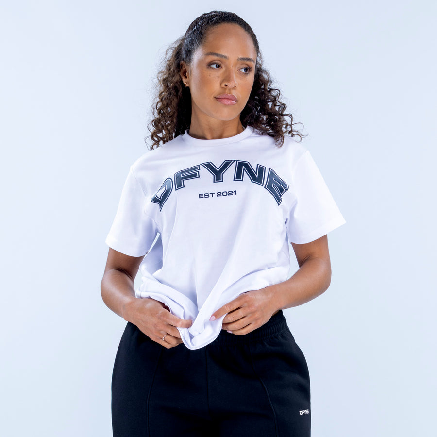 White oversized graphic T-shirt with DFYN and EST 2021 chest print