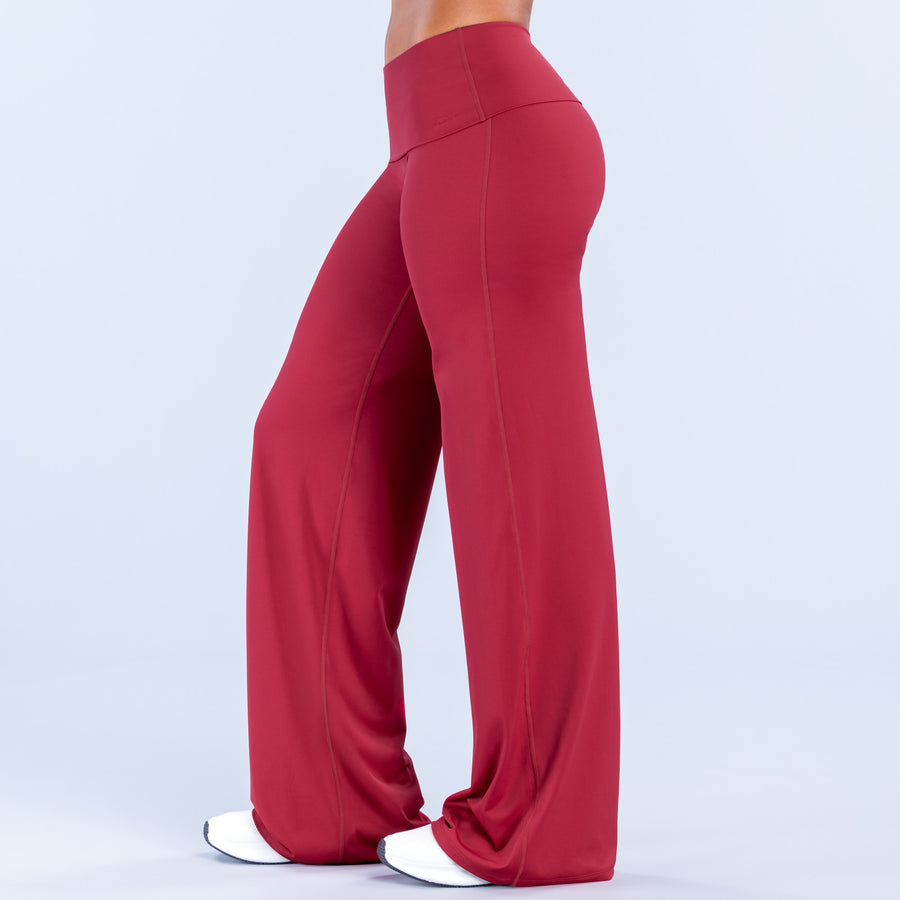 Burgundy foldover wide-leg pants, back view with high waist and flared hem