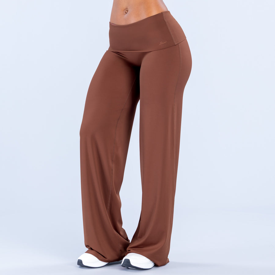 Fold-over wide-leg pants in rust brown, back view with long straight drape