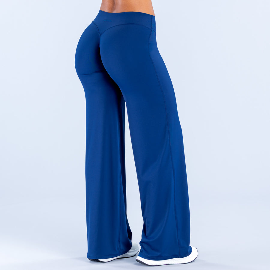 Blue wide-leg pants with high waistband and relaxed back shaping