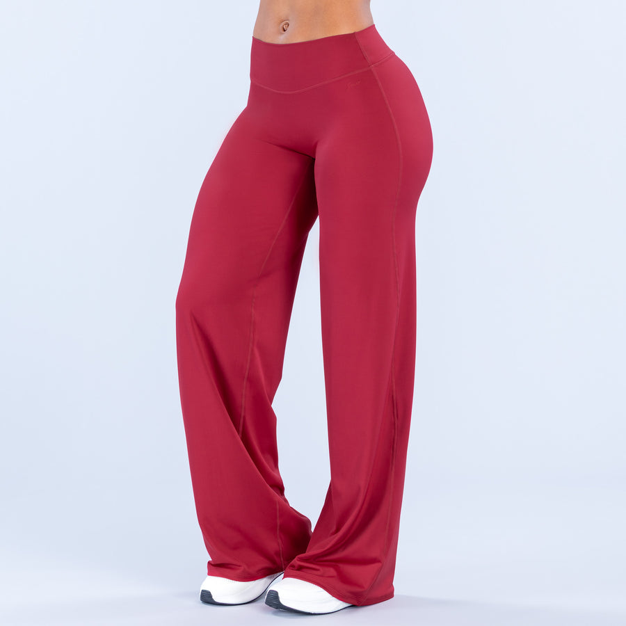 High-waist wide-leg pants, solid deep red, full length.