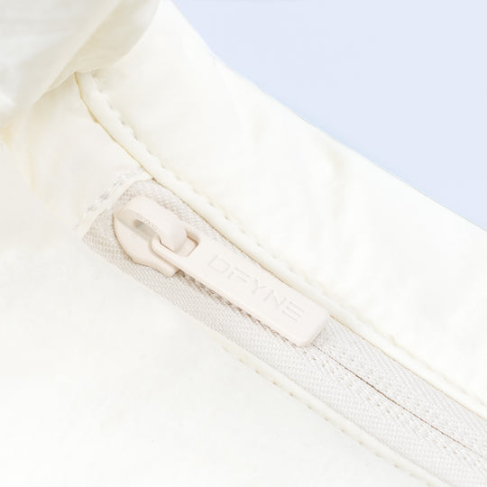 Sav puffer bag: off-white zip pocket and padded strap detail