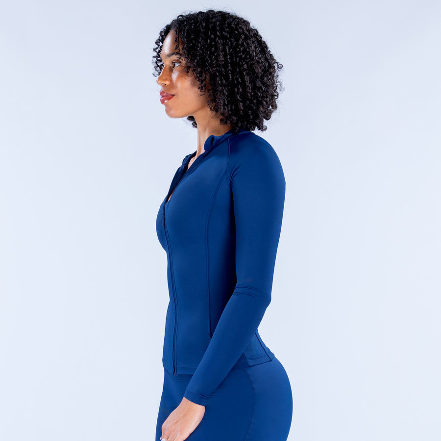 Blue zip-up jacket, hoodless, side view, full sleeves, front zipper