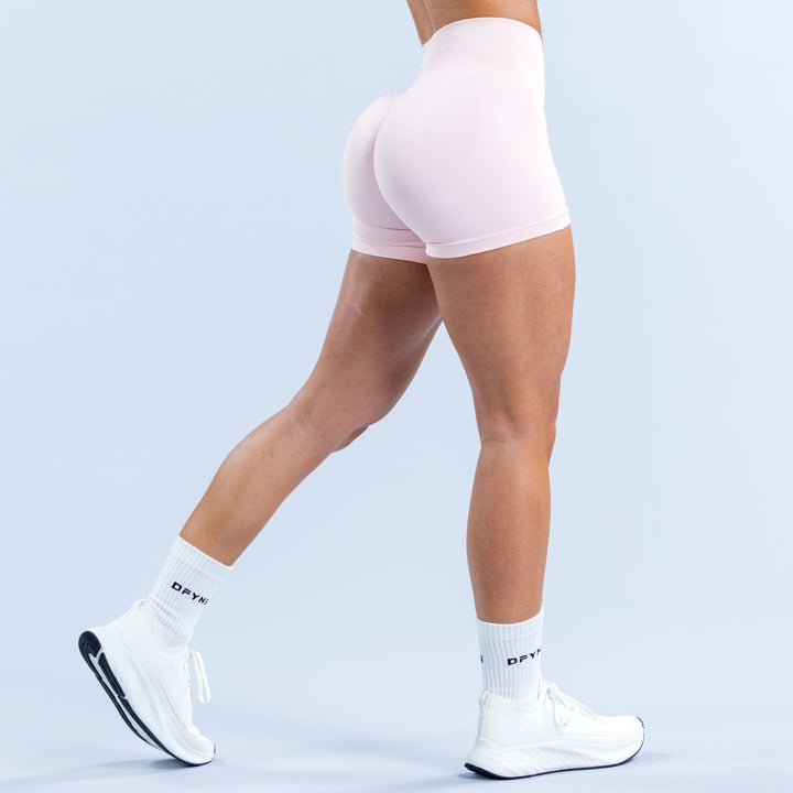4.5-inch light pink athletic shorts, back view