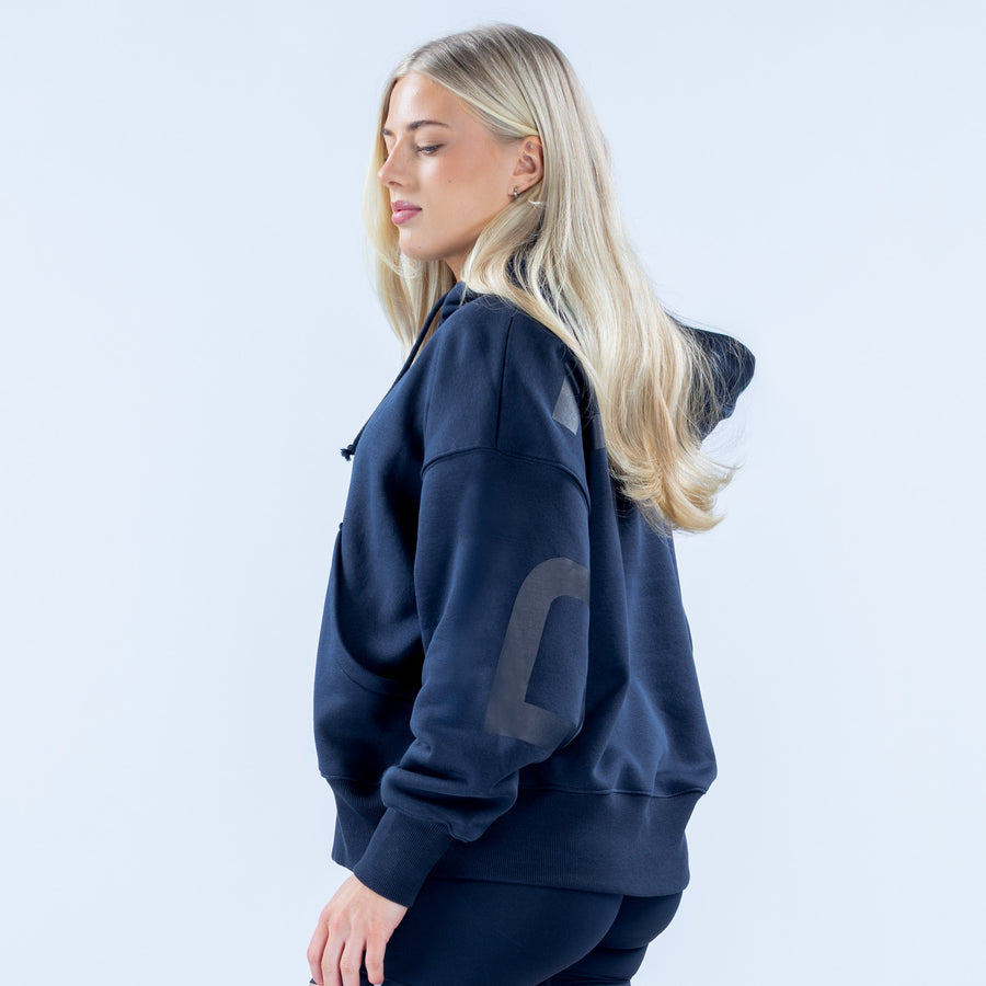 Navy pullover hoodie with hood, front pocket, and long sleeves