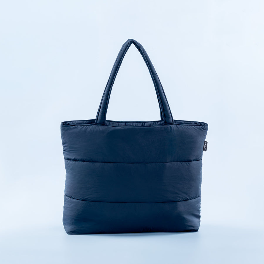 Dark blue puffer tote bag with top handles and padded front panel