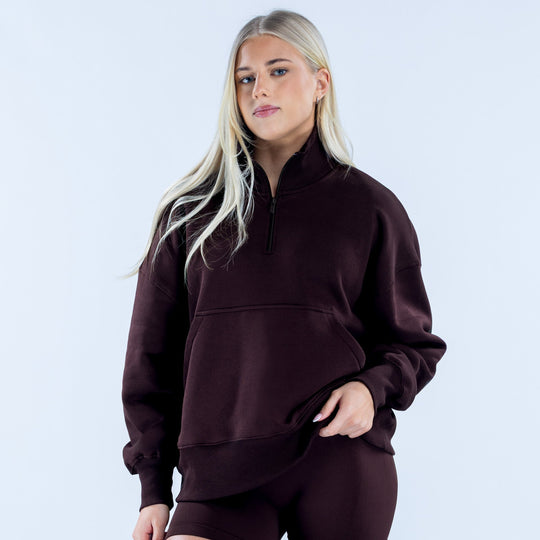 Dark plum quarter-zip sweatshirt with kangaroo pocket, long sleeves