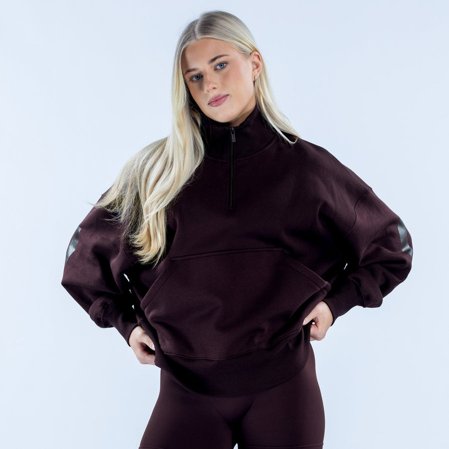Dark plum quarter-zip sweatshirt with zip collar and front kangaroo pocket
