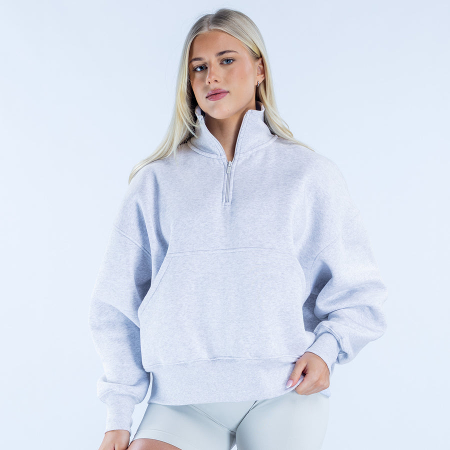Light heather gray quarter-zip sweatshirt with front kangaroo pocket