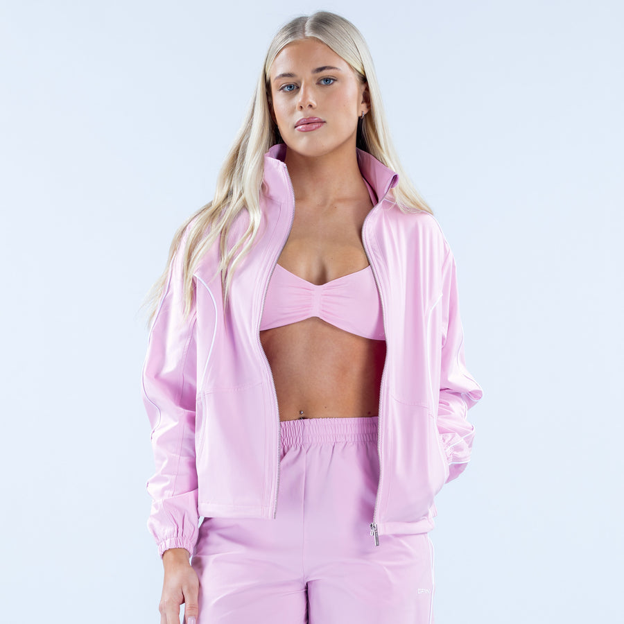 Pink track jacket with full zipper and stand collar, elastic cuffs