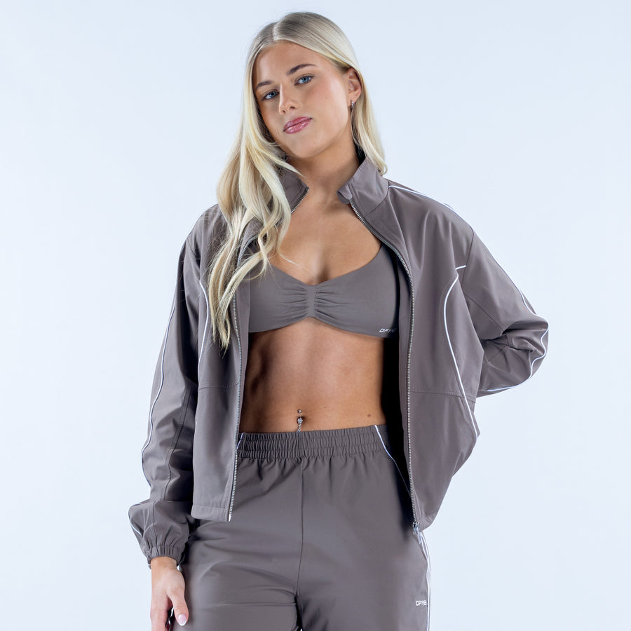 Signature track jacket in dark gray with white piping and full-zip front
