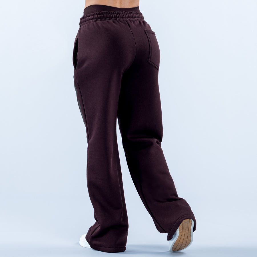 Wide-leg jogger pants in dark plum, elastic waistband, back pocket seam, side graphic