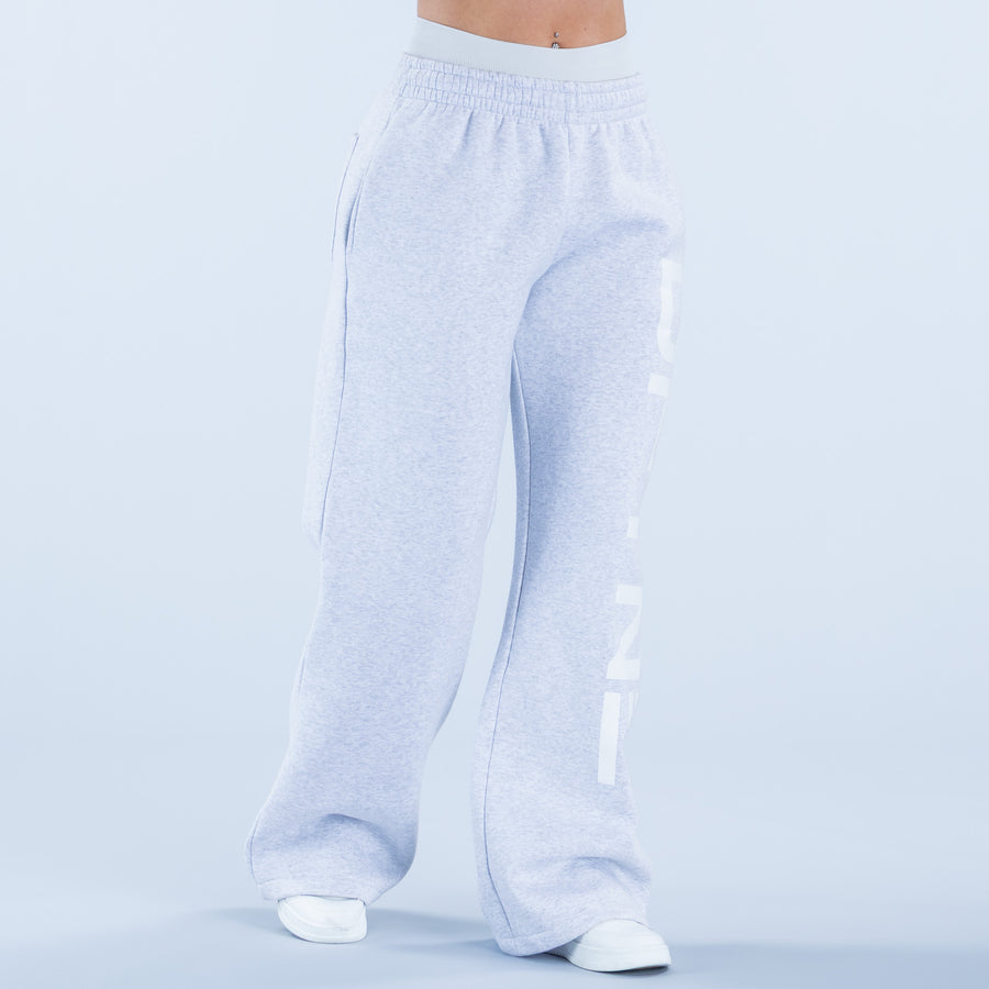 Light blue wide-leg jogger pants with elastic waistband and side pocket detailing