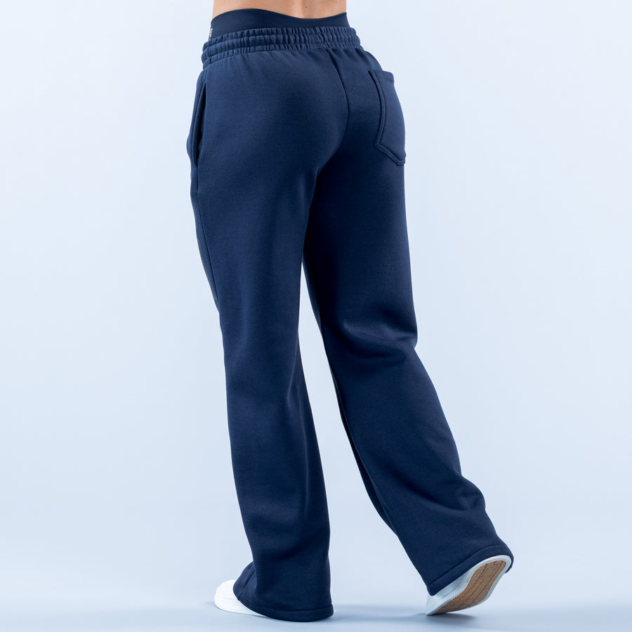 Navy wide-leg jogger pants with elastic waistband and curved back pocket seams