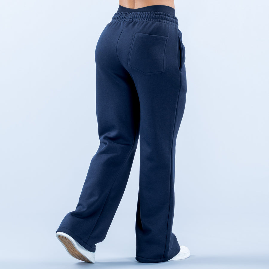 Navy wide-leg jogger pants with elastic waistband and back patch pocket detail