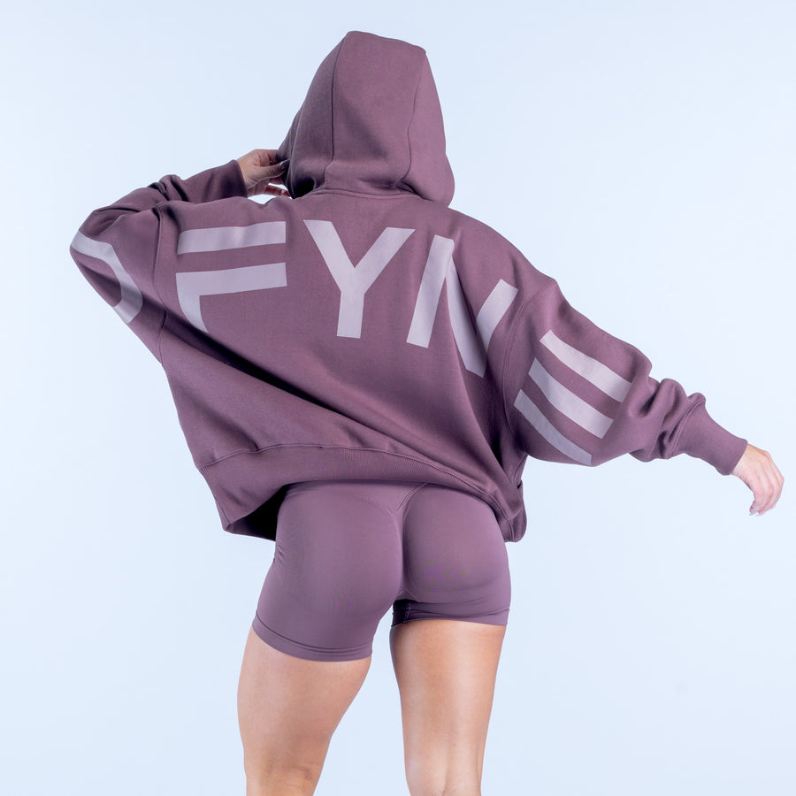 Purple hoodie with large back logo print and kangaroo pocket.